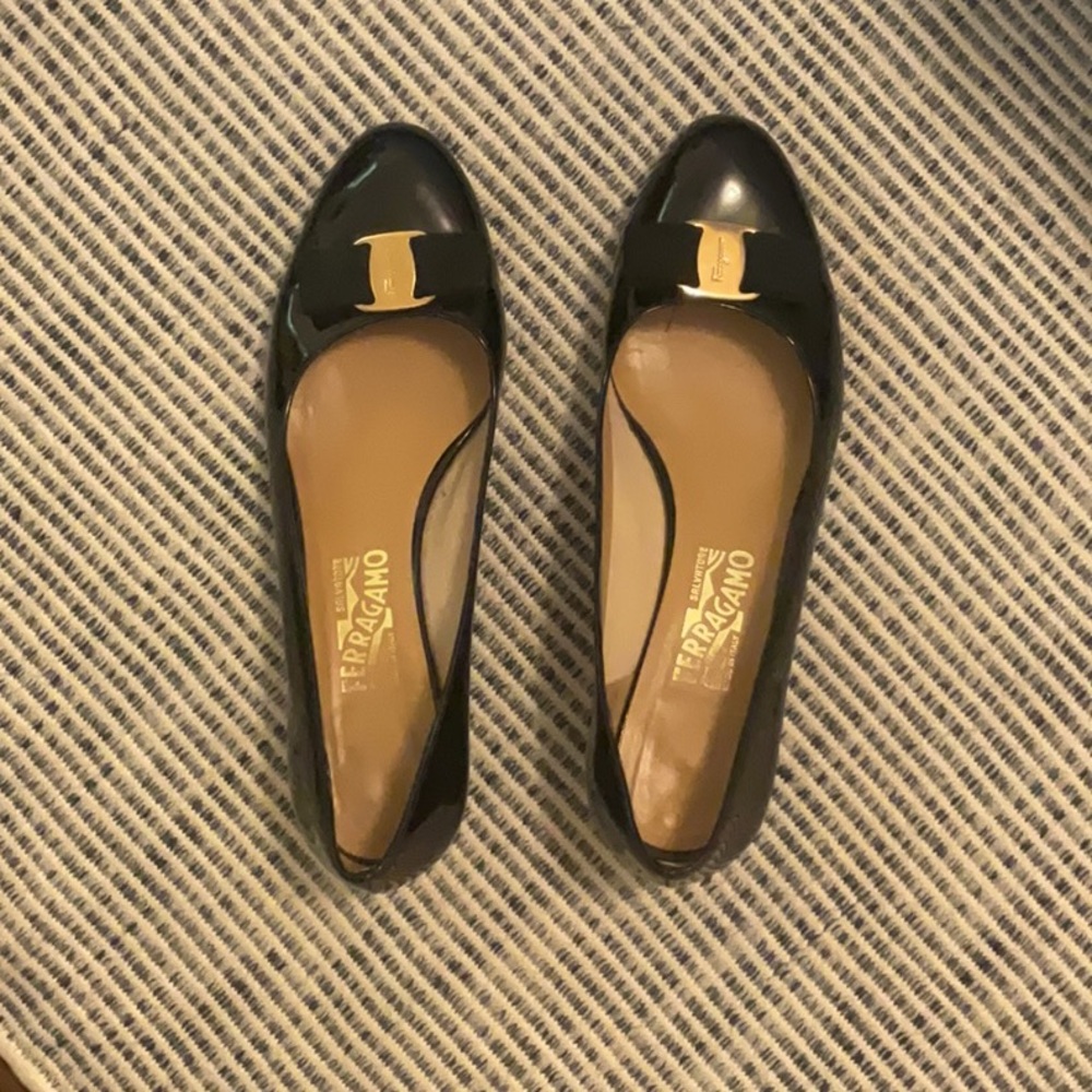 Salvatore Ferragamo Black high heals with Gold Hardware